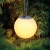 Hängende Solarkugel für Außen mit umschaltbarem warm-weißen oder bunten LED-Licht | Ø 20 cm | inkl. Aufhängung | Deko-Kugel in Milchglas-Optik - 1